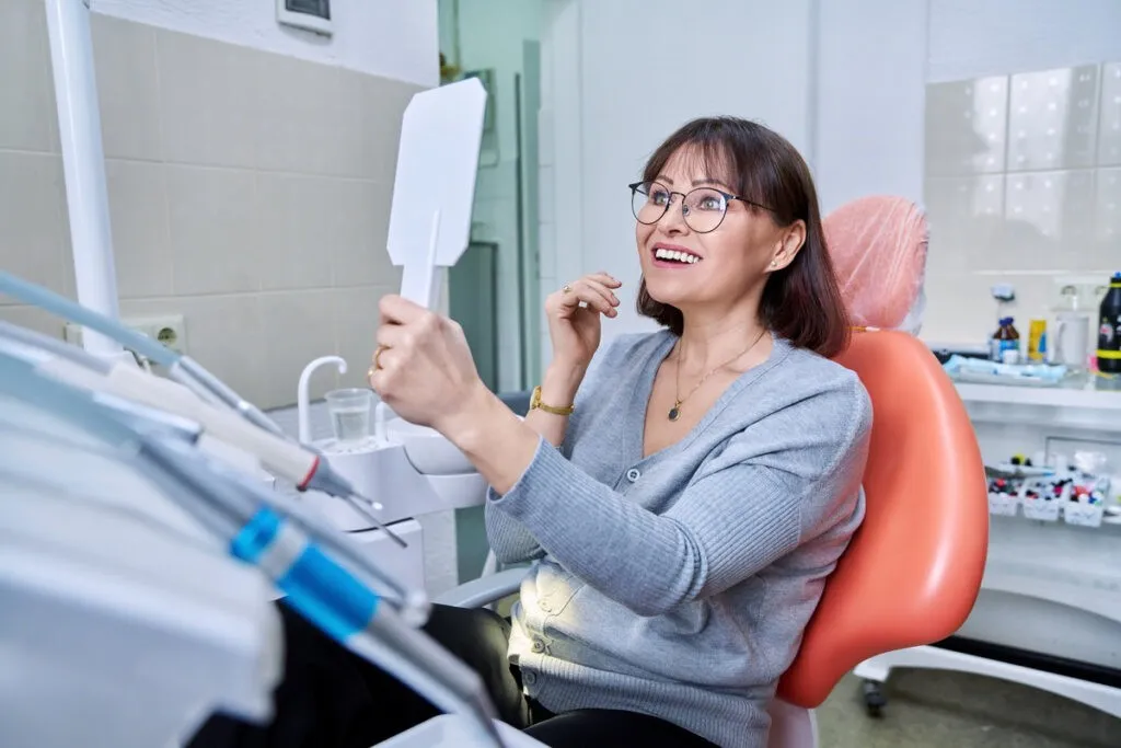 Dr. Knapton discussing ceramic dental implants with a patient at Club K Holistic Dental in Springfield MO