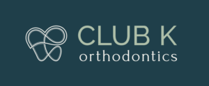Club K Orthodontics logo – blue version for dark backgrounds