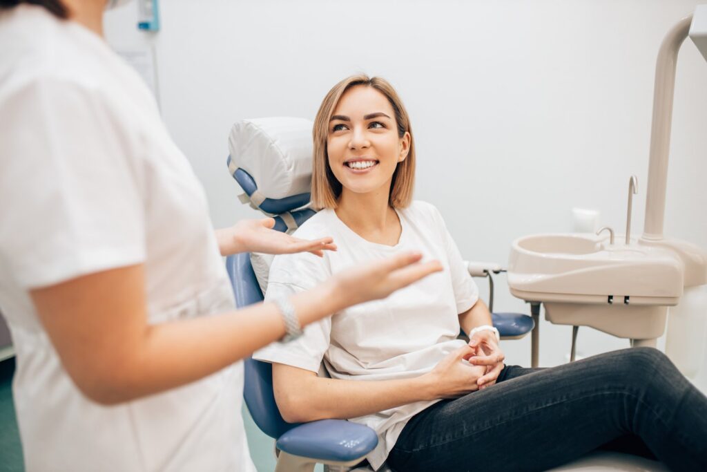 Woman waiting for a dental treatment consultation at a holistic dental office