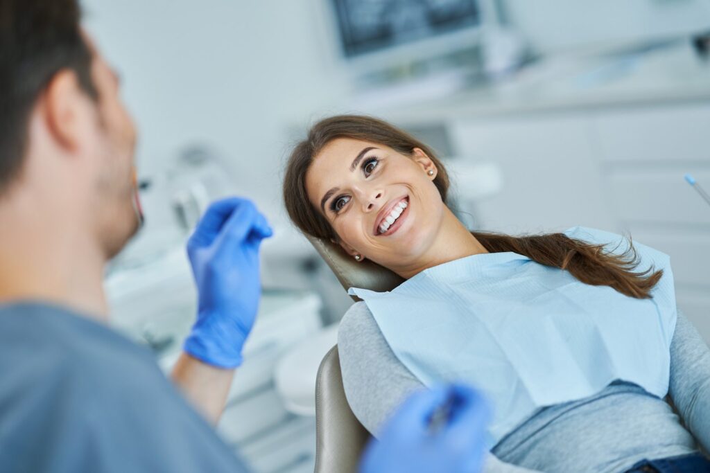 Dentist consulting with a patient about clear aligner treatment options